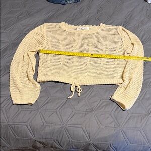 Her entire name says Grace Cream Knit Cropped Sweater